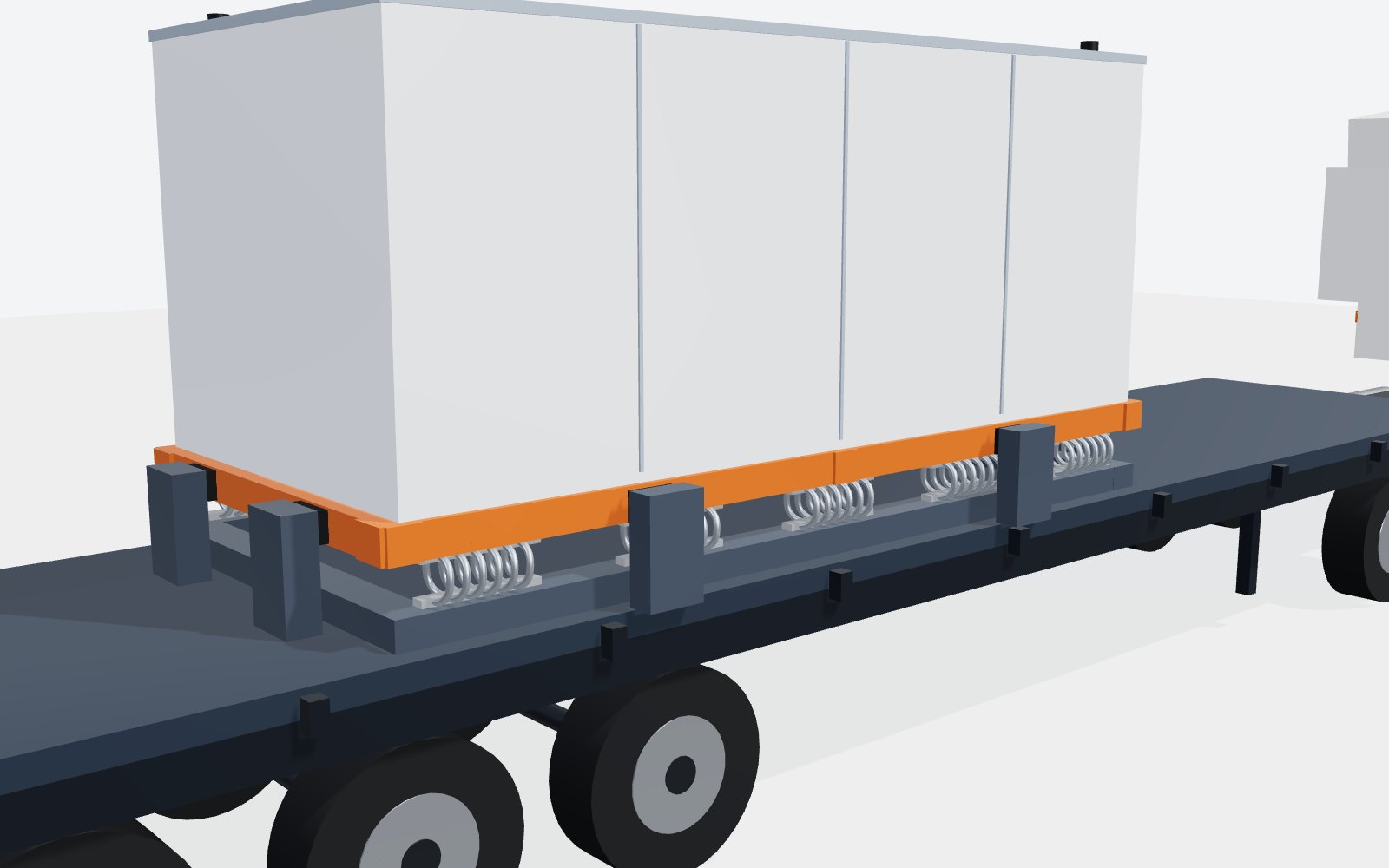 Equipment skid on compression wire rope isolators on a flatbed