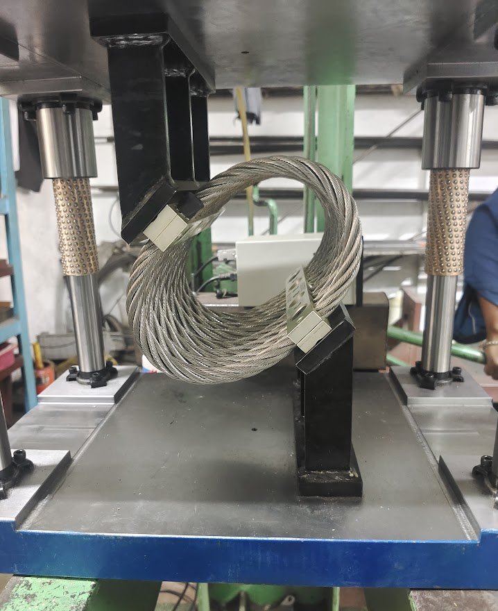 AWRI isolator held at 45 degrees in the test press fixture